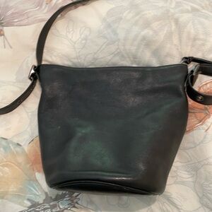 Vintage Coach black leather mini bucket cross body.